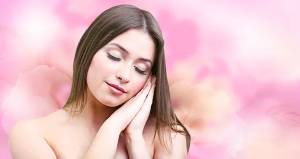 Beautiful young woman having relax on bright pink background — Stock Photo, Image