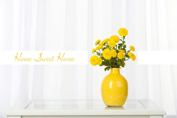 Beautiful flowers in vase on window background and space for your text — Stock Photo, Image