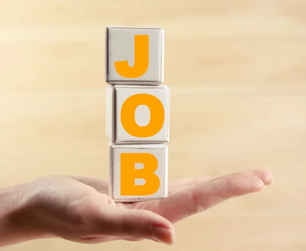 Job word spelled with wooden cubes — Stock Photo, Image