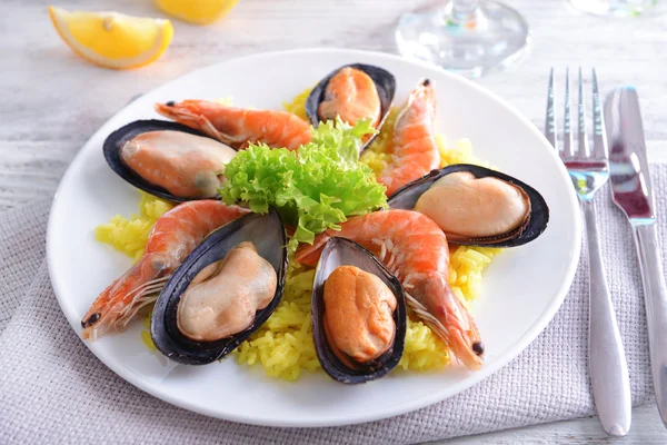 Seafood Paella on plate on table close-up — Stock Photo, Image