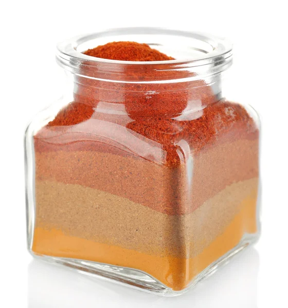 Olika sorters kryddor i glasflaska isolerad på vit — Stockfoto