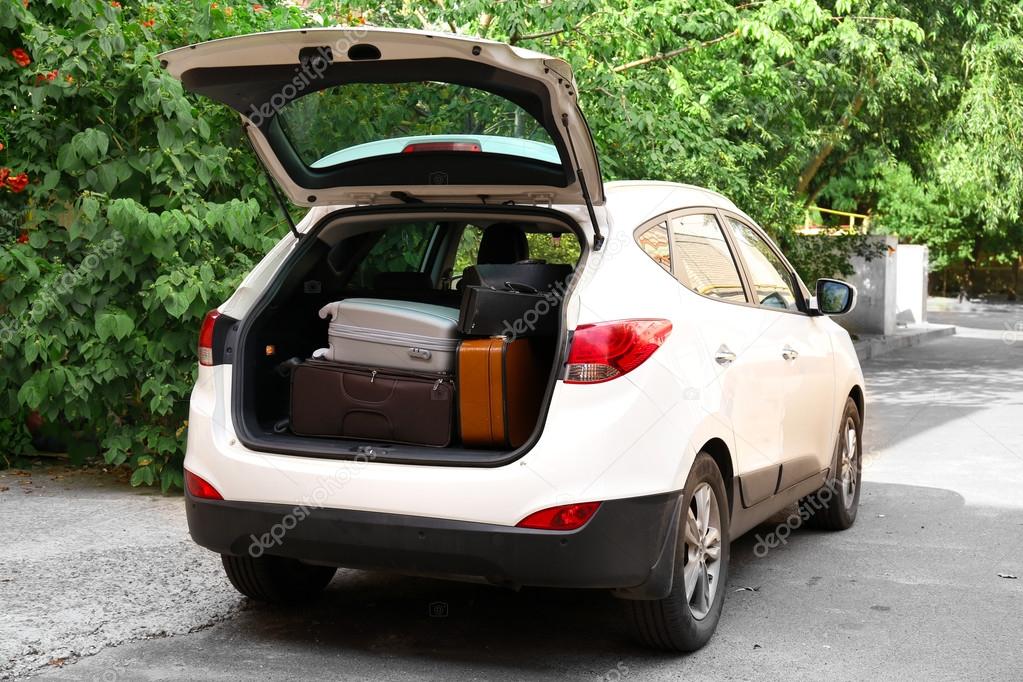 Suitcases and bags in trunk