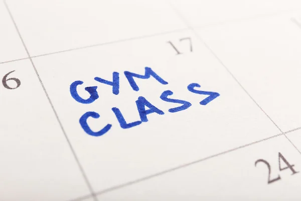 Plano escrito Aula de ginástica no fundo da página do calendário — Fotografia de Stock