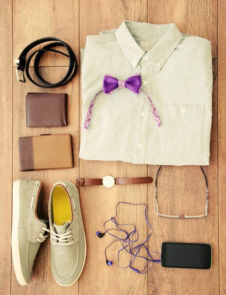 Still life of casual man on wooden background — Stock Photo, Image