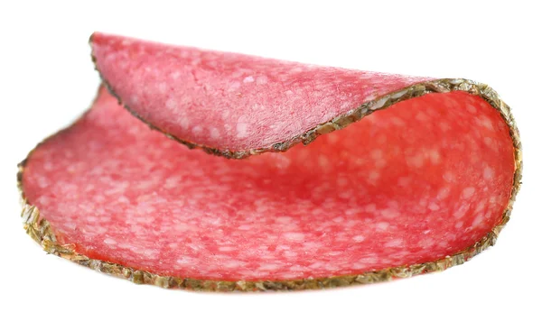 Fetta di salame isolata su fondo bianco — Foto Stock