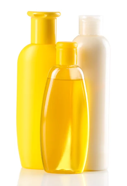 Gruppo di bottiglie cosmetiche isolate su bianco — Foto Stock