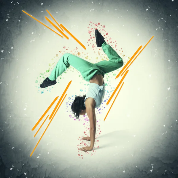 Hip hop dancer portrait on grunge background — Stock Photo, Image