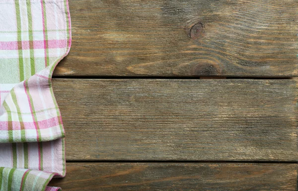 Napkin on wooden table — Stock Photo, Image