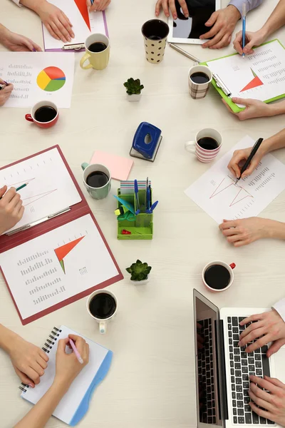 Group of business people working at desk top view — Stock Photo, Image