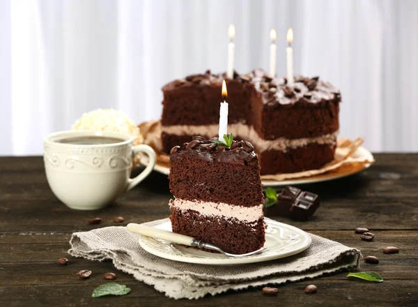Delicious chocolate cake on table on light background — Stok Foto