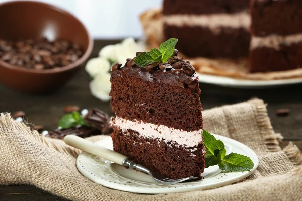 Delicious chocolate cake on table close-up — Stock Photo, Image