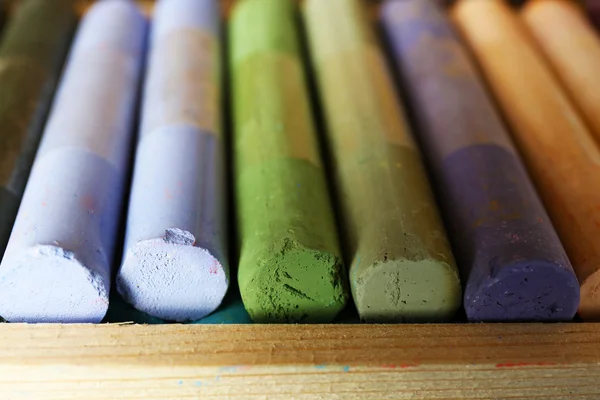 Colorful chalk pastels in box close up — Stock Photo, Image