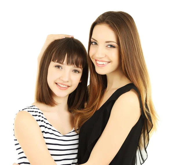 Två vackra flickor isolerad på vit — Stockfoto