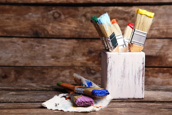 Brushes with colorful paints — Stock Photo, Image