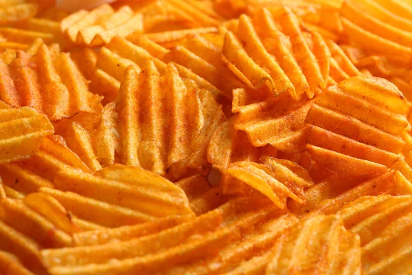 Deliciosas batatas fritas close-up fundo — Fotografia de Stock