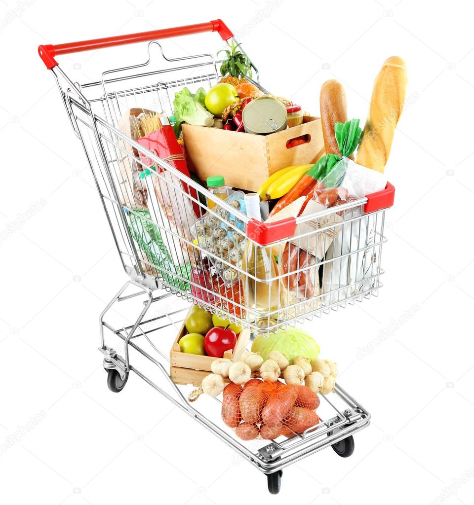 Shopping cart full with various groceries isolated on white 