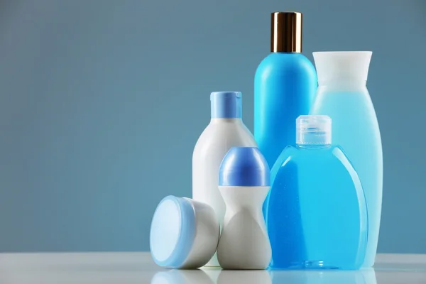 Cosmetic bottles on light background — Stock Photo, Image