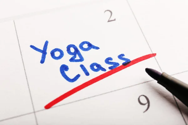 Written plan Yoga Class on calendar page background — Stock Photo, Image