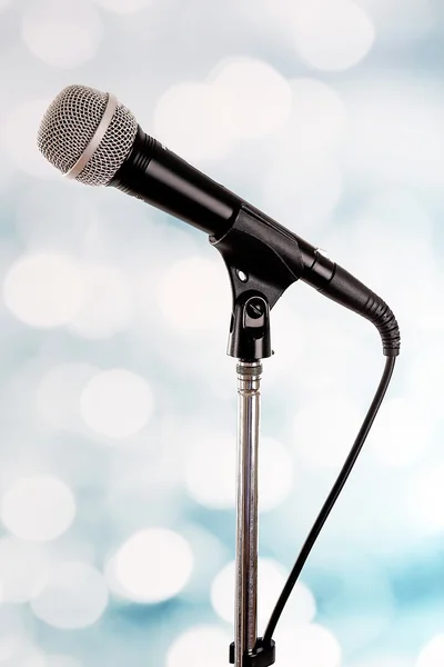 Microphone on stand on light background — Stock Fotó