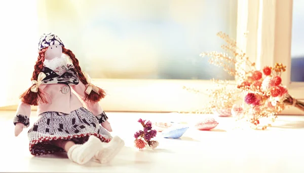 Handmade doll near window close-up — Stock Photo, Image