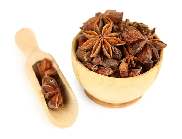Star anise in wooden bowl, isolated on white — Stock Photo, Image