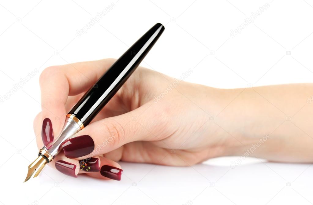 Fountain pen in female hand isolated on white