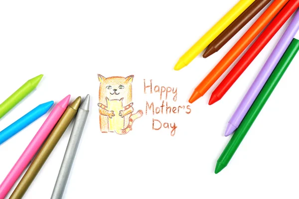 Happy Mothers Day message written on paper with pencils close up — Stock Photo, Image
