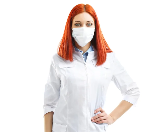 Genç güzel doktor tıbbi maske üzerinde beyaz izole — Stok fotoğraf