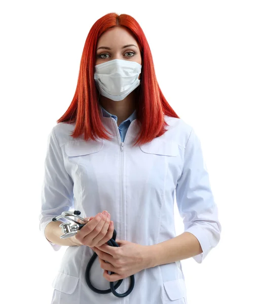 Joven médico hermoso en máscara médica aislado en blanco —  Fotos de Stock