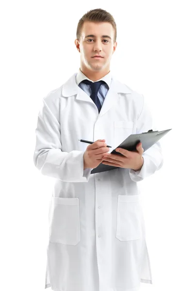 Male Doctor holding clipboard isolated on white — Stock Photo, Image