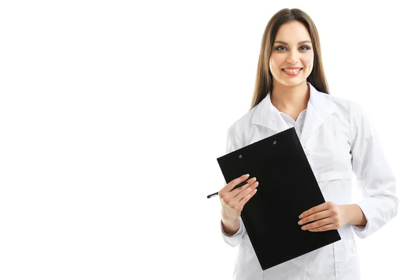 Young beautiful doctor with clipboard isolated on white — Stock Photo, Image