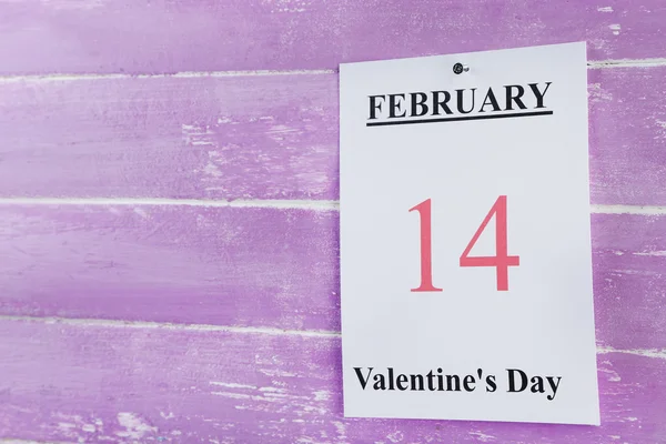 Valentines Day, February 14 on calendar on wooden background — Stock Photo, Image