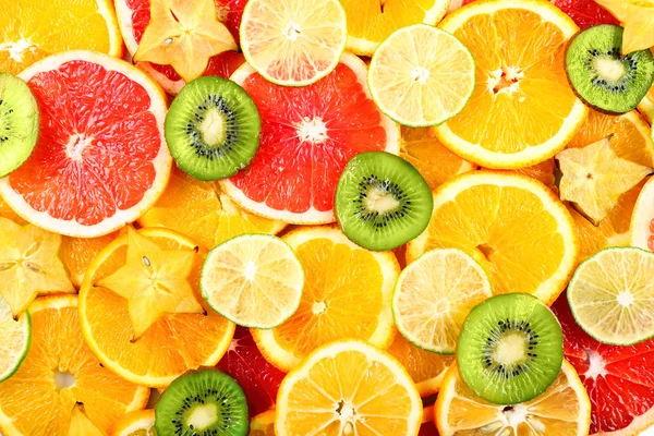 Sliced fruits background — Stock Photo, Image