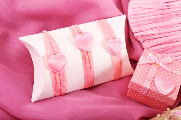 Handmade gifts on Valentine Day, on fabric background — Stock Photo, Image