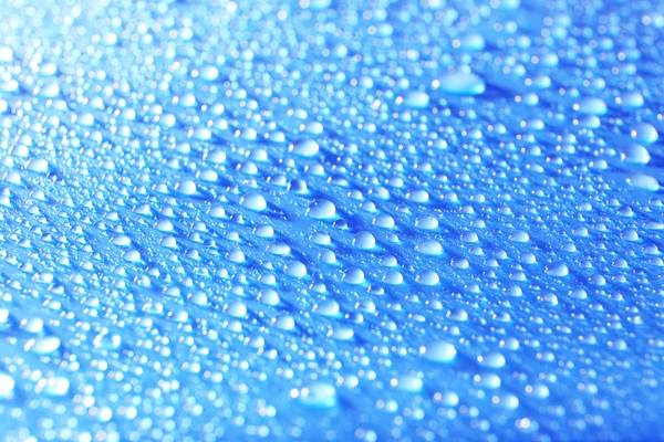 밝은 파란색 배경에 물 상품 — 스톡 사진
