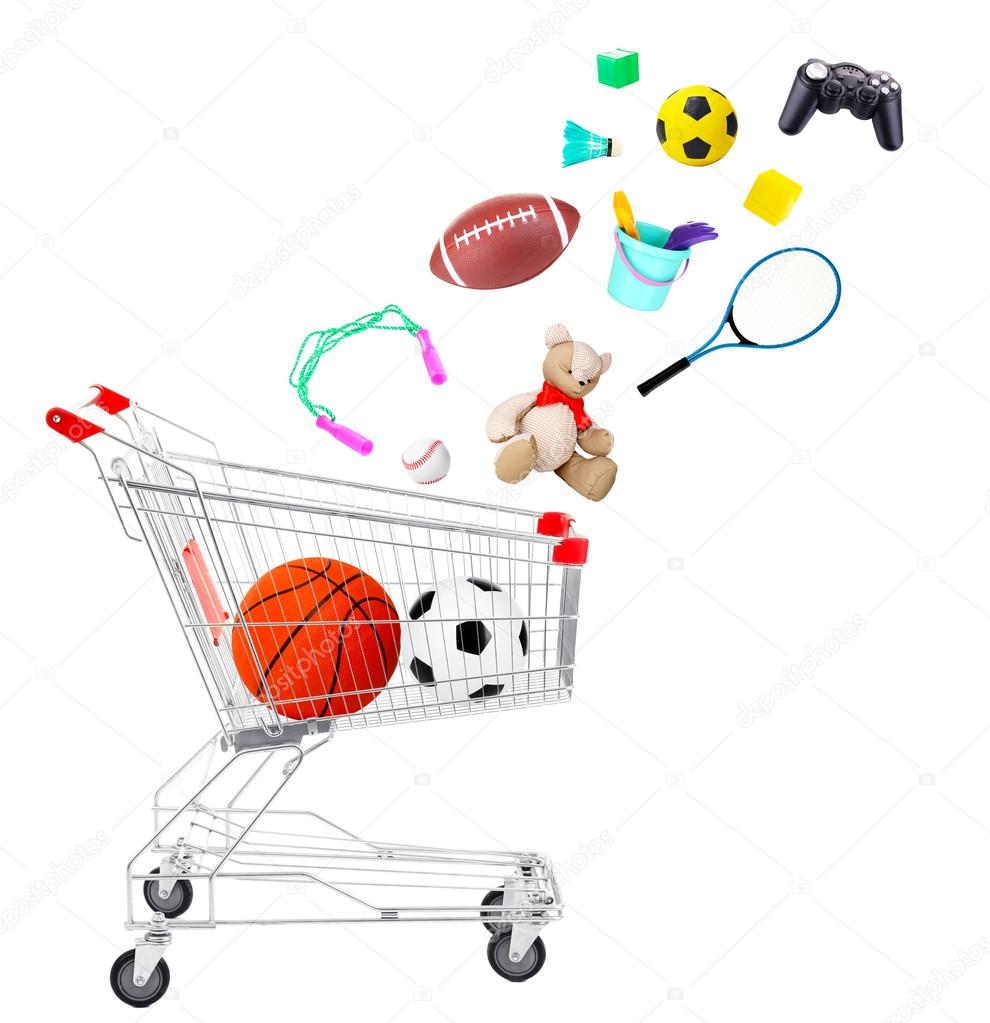 Sport goods and toys falling into cart isolated on white