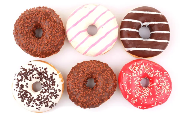 Heerlijke donuts met suikerglazuur geïsoleerd op wit — Stockfoto
