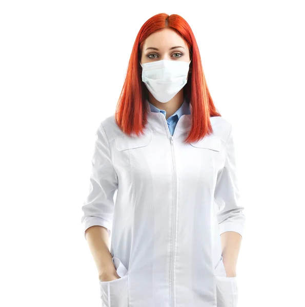 Young beautiful doctor in medical mask isolated on white — Stock Photo, Image