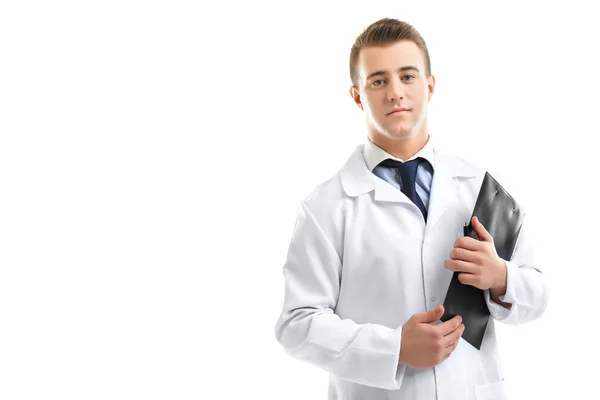 Male Doctor holding clipboard isolated on white — Stock Photo, Image