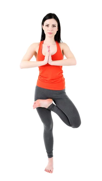 Mujer joven haciendo yoga aislado en blanco — Foto de Stock