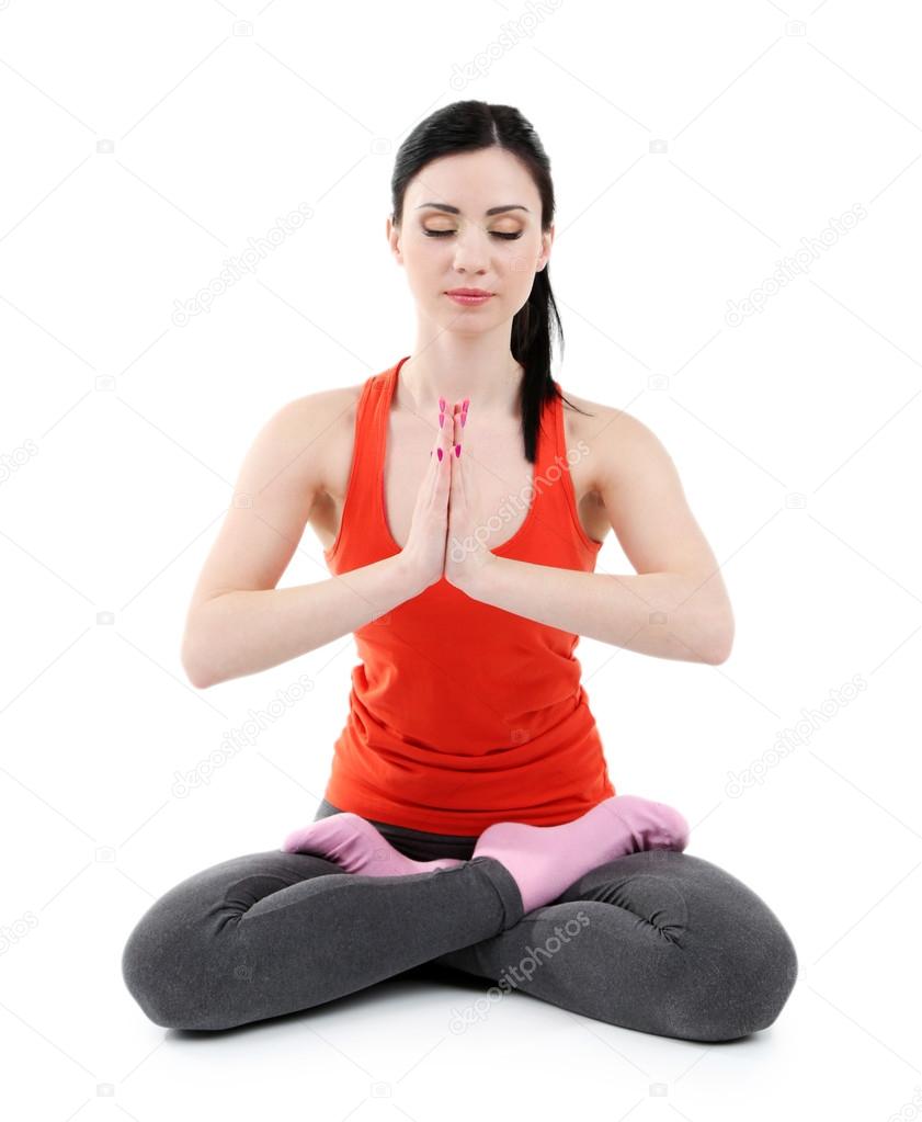 Young woman doing yoga isolated on white