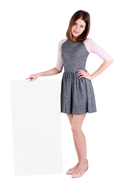 Mooie jonge vrouw met lege poster geïsoleerd op wit — Stockfoto