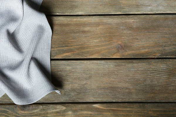 Napkin on wooden table — Stock Photo, Image