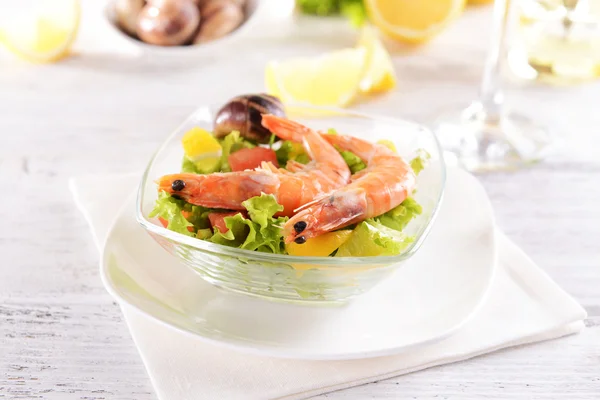 Tasty seafood on plate on table close-up — Stock Photo, Image