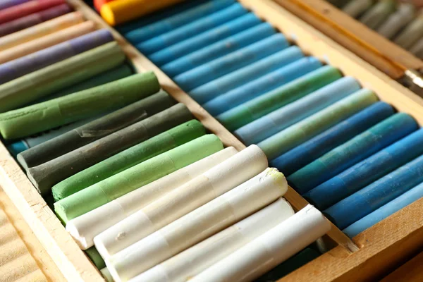 Colorful chalk pastels in box close up — Stock Photo, Image