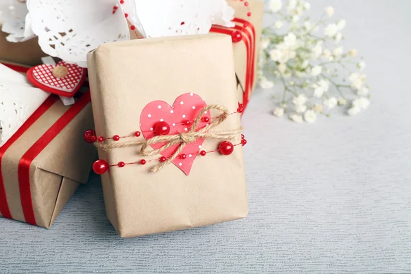Beautiful gifts on grey background. Valentine Day concept — Stock Photo, Image