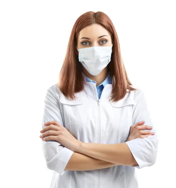 Young beautiful doctor in medical mask isolated on white — Stock Photo, Image