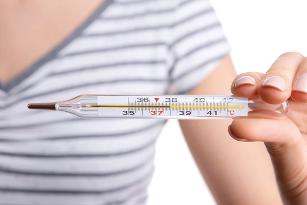 Frau hält Thermometer aus nächster Nähe — Stockfoto