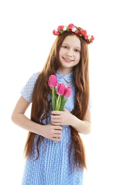 Bella bambina con fiori, isolata su bianco — Foto Stock