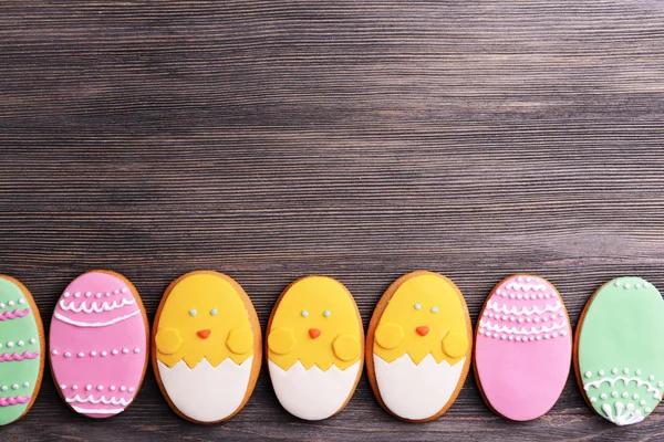 Delicious Easter cookies on wooden background — Stock Photo, Image